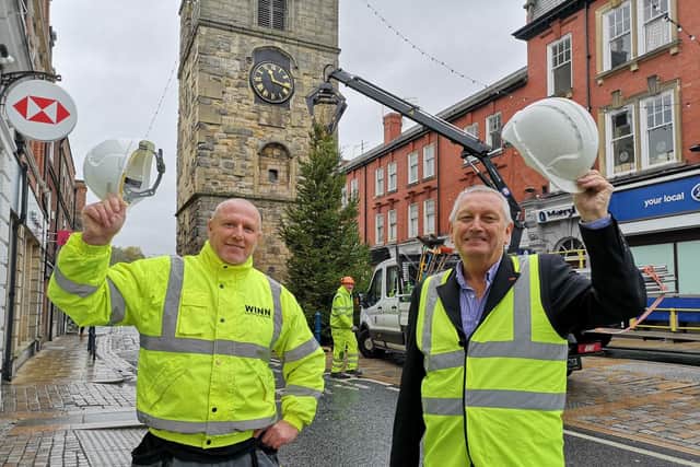 Bryan Winn, left, and Ken Brown with the new Morpeth Christmas tree behind them. Pictures and video by Jane Coltman.