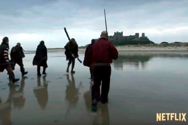 Bamburgh beach and castle appearing on the trailer for the third series of the Netflix drama Frontier.