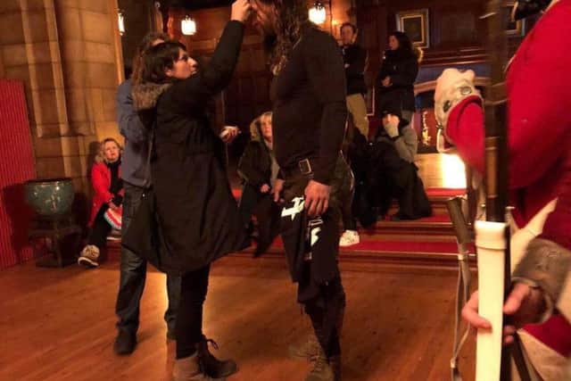 Jason Momoa in the King's Hall at Bamburgh Castle during filming for Frontier.