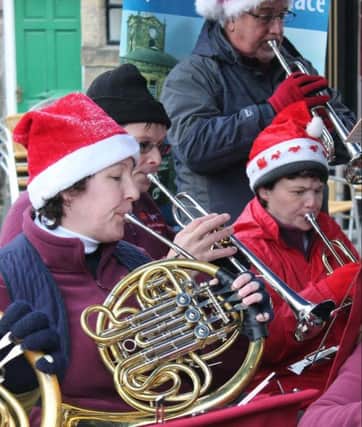 Musicians at a previous Alnwick Christmas Market.
