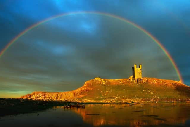 A rainbow over Dunstanburgh Castle. Picture by Jane Coltman