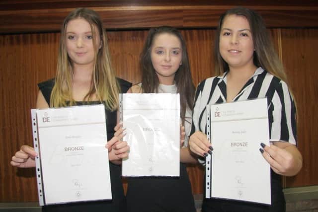 Erin Douglas, Dee-Anne Common and Bethany Sales got bronze Duke of Edinburgh Awards at James Calvert Spence College in Amble.
Picture by Bart Rippon