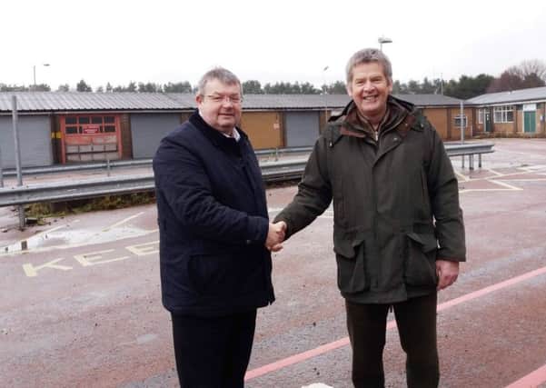 Mick Thorburn, left, with Alnwick county councillor Gordon Castle at the Willowburn depot.