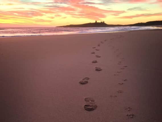 Andy Craig's winning image of footsteps in the sand.