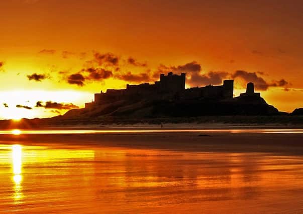 Gold celebrations for Northumberland.  Picture of Bamburgh Castle by Jane Coltman