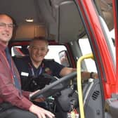 Coun John Riddle with Chief Fire Officer Paul Hedley in one of Northumberland Fire and Rescue Service's new appliances.