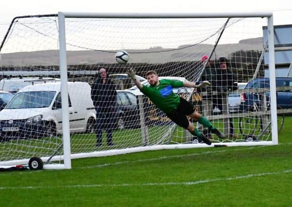 Alnwick Town Development Squad keeper Tony Athey makes a brilliant save in the local derby against North Sunderland, which finished 0-0. Picture by Jason Sumner