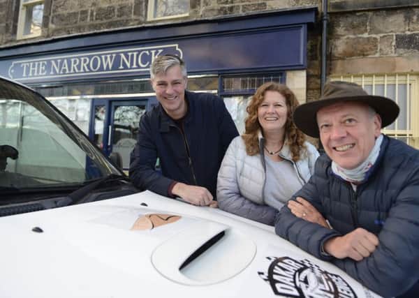Nick Redmayne, right, with sponsors Paul and Sarah Johnson of the Narrow Nick in Rothbury. Picture by Jane Coltman