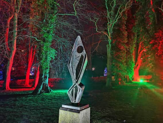 The Barbara Hepworth sculpture has been lit as a feature of the Christmas Light Show at The Alnwick Garden.