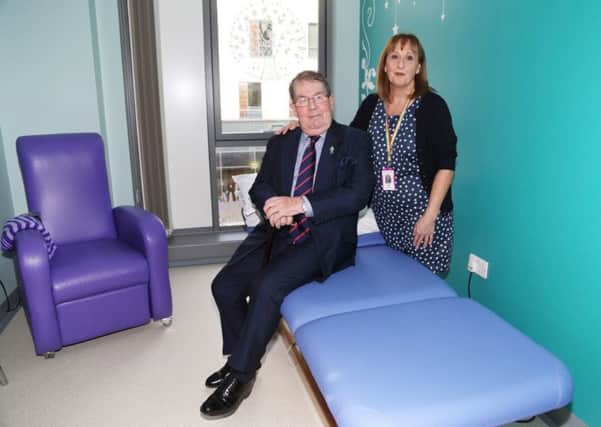Tommy Moralee with complementary therapy lead Angela Jackson in the new suite for cancer patients.
