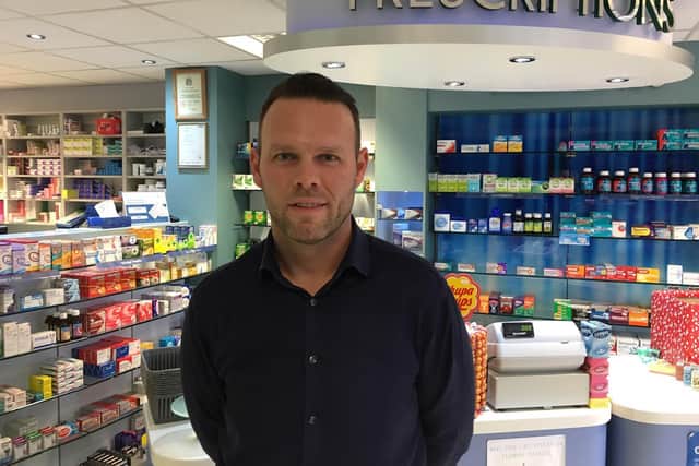Pharmacist Chris Holmes