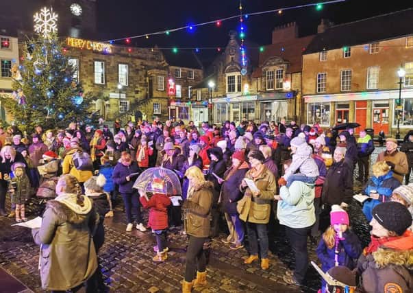 The BIG Christmas Sing in Alnwick Market Place.  Picture by Jane Coltman