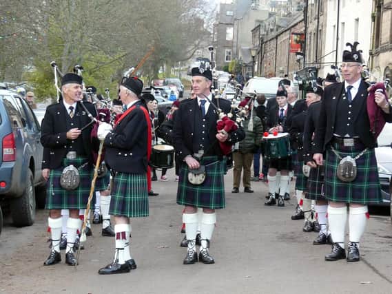 Rothbury Highland Pipe Band on their New Year's Day tour, photographed by Jeff Reynalds.