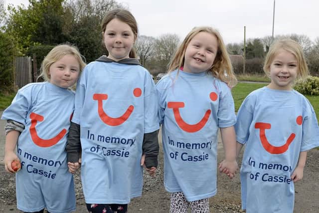 Some of the youngsters taking part in the Cassie Hayes memorial walk, including Cassie's daughter Ruby, second from the right..  Picture by Jane Coltman