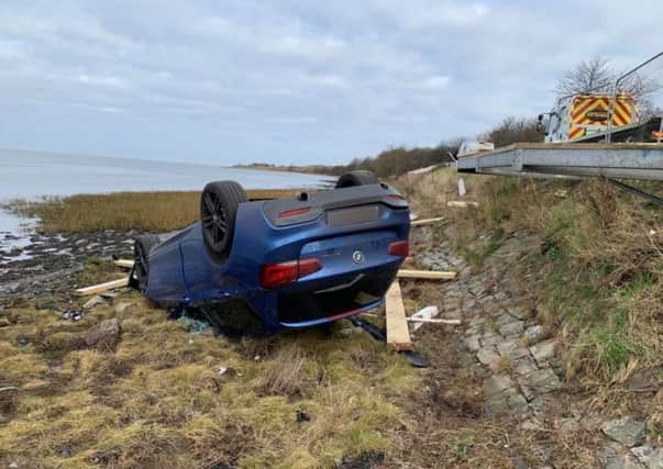 A car crashed off the road at Budle Bay, near Bamburgh.