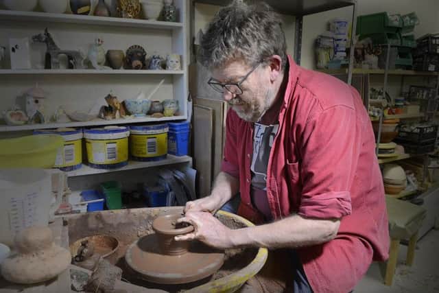 Graham Taylor at his potters wheel  he will be making a replica Roman bowl for Marc Allum over the next few months. Picture by Jane Coltman