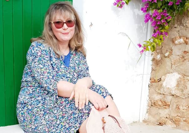 Artist Stella Vine relaxing in Ibiza.