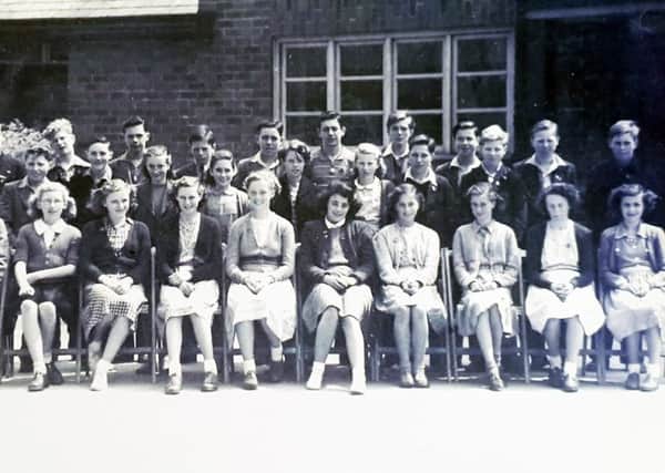 Winifred Cleverly nee Hall - who lived in Swansfield Park Road prior to her moving to Cornwall is pictured fourth from the right on the bottom row..