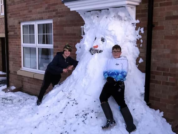Garry's two sons, Alfie and Jack, who helped with the snowman prank.