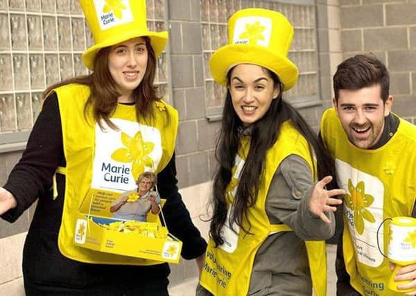 Collectors taking part in Marie Curie's Great Daffodil Appeal.
