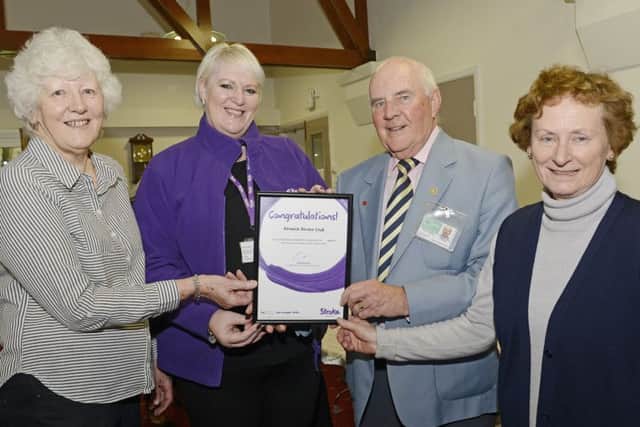 Alnwick Stroke Club secretary Jen Hall with Donna Stott from the Stroke Association, club chairman George Stokoe and treasurer Micki Biddle at the 40th anniversary coffee morning at St Paul's Court. 
 Picture by Jane Coltman