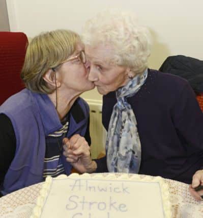 Birthday wishes: Alnwick Stroke Club 40th anniversary coffee morning at St Paul's Court where celebration cake was cut by Helen Clark and Annice Waddell. 
 Picture by Jane Coltman