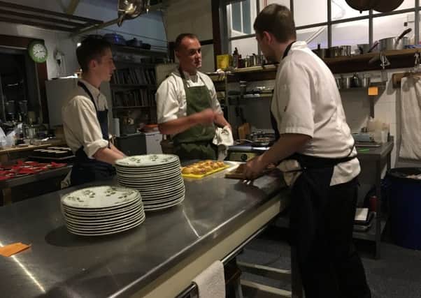 Andrew Wilkinson and sous chefs cooking at The Old Dairy in Ford.