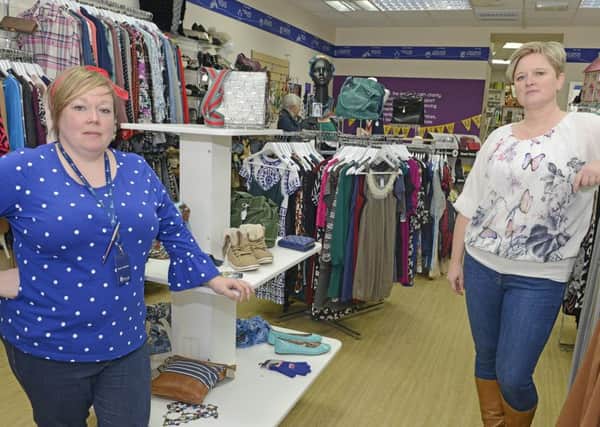 Assistant manager Amy Snaith and manager Helen McMillan at the MIND charity shop in Alnwick. Picture by Jane Coltman