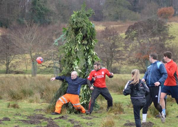 Action from Alnwick's Shrovetide football match last year. Picture by Jason Sumner