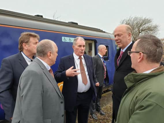 Chris Grayling, second from right, with the three Bedlington councillors, left, and council leader Peter Jackson, right, during the visit.