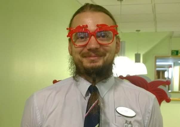 Optical assistant Jack Crawford models the Comic Relief frames.