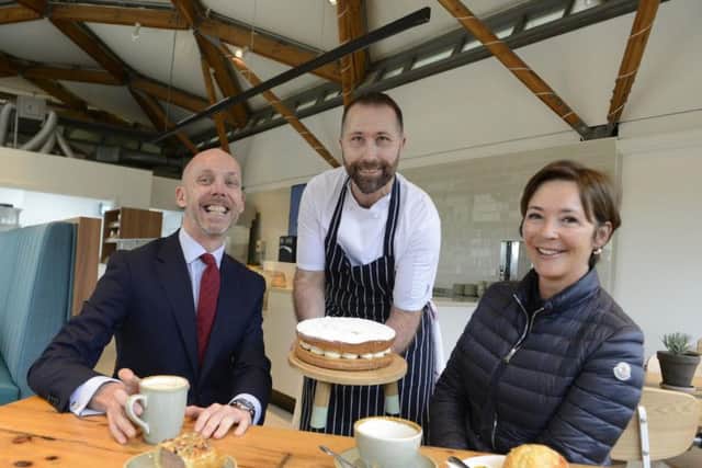Searcy's MD Matt Thomas with the Duchess of Northumberland and baker Lee Quigley. Picture by Jane Coltman