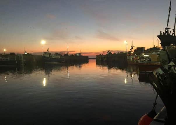 All is calm at sunrise at Seahouses harbour by Glen Annison. 184 Facebook likes