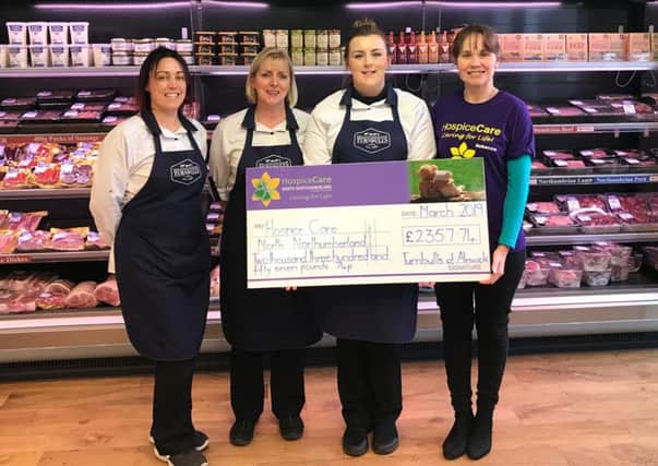 Turnbull's butcher presenting HospiceCare North Northumberland with a cheque for £2,357 from the week of fundraising activities for the hospice.