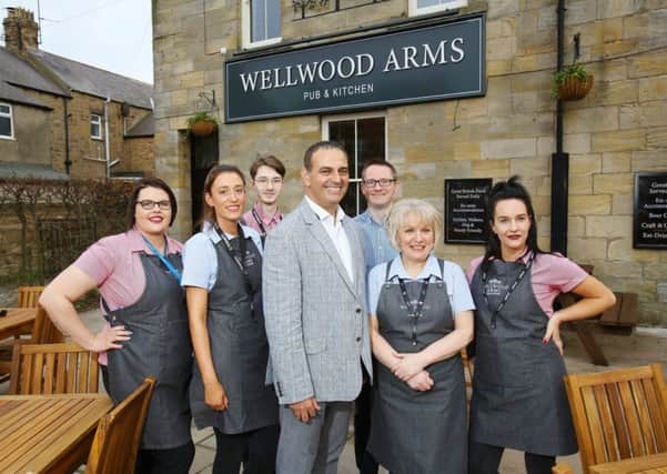Wellwood Arms landlord Mark Rae and his team.