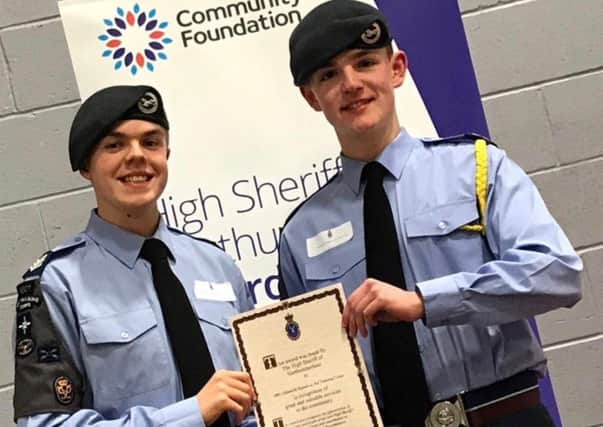 1801 Squadron, Alnwick Air Cadets receive the High Sheriff of Northumberland's Award. Pictured Sergeant Tom Cheesmer and on the right is Flight Sergeant Callum Wallace