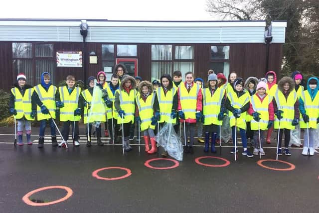 Pupils in Year 5 and 6 at Whittingham C of E Primary School did a village clean-up.