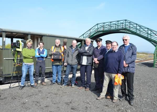 Chris Tarrant and the film crew with Aln Valley Railway volunteers at Lionheart station.