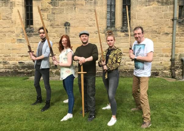 Mark Vance, centre, who runs medieval combat workshops at Alnwick Castle, puts new recruits Gary Burdon, Helen Doyle, Danielle Kemp and Jimmy Dodds through their paces.