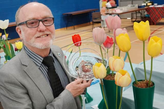 Geoff Watson was delighted to win the Duchess's trophy with his tulips. Picture by Jane Coltman