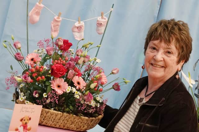 In the pink! Frances Cook won the cup for best use of colour in the floral art classes. Picture by Jane Coltman