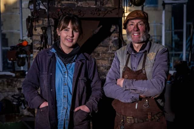 Stephen Lunn and his daughter Ashlee Donaldson at the forge. Picture by Marco Damian Photography