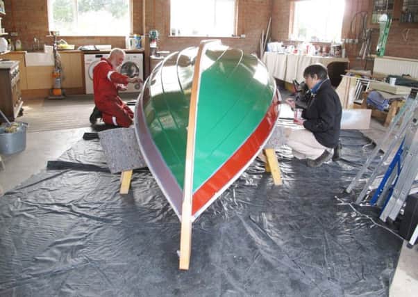Alnmouth's new skiff gets a paint job.