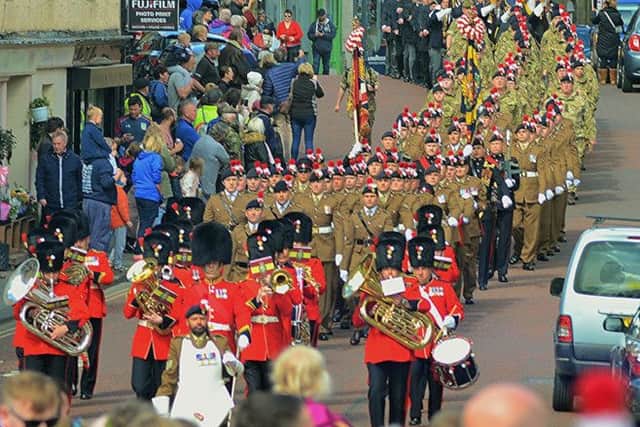 The Band of The Royal Regiment of Fusiliers leads the St Georges Day parade through Alnwick on Saturday, April 27. Picture by Steve Miller.