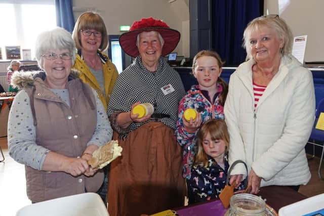 The butter making stall was a popular attraction. Picture by Jane Coltman