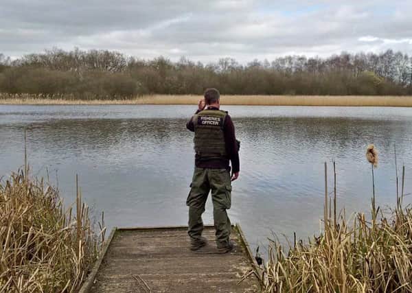 A fisheries enforcement officer on patrol.