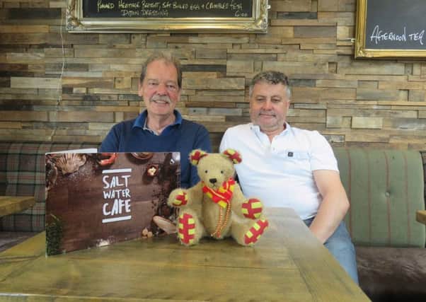 Colin Brunt, treasurer of various Beadnell community groups, and Chico Gomes, owner of the Craster Arms, Saltwater Cafe and Black Swan Inn, Seahouses, at the launch of new Northumberland Day mascot, Northumbear.