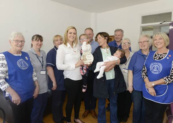 Ada Rose Telfer with mum Olivia, dad Simon, big sister Eliza, the Duchess of Northumberland, staff from Hillcrest maternity unit and members of the League of Friends. Picture by Jane Coltman