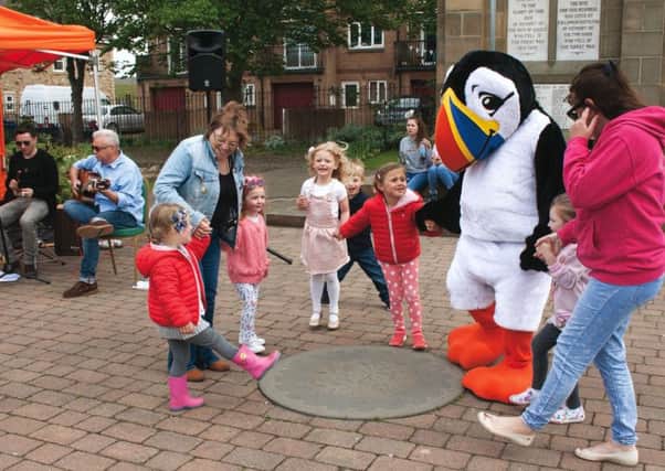 Having fun at Amble Puffin Festival. Picture by The Ambler