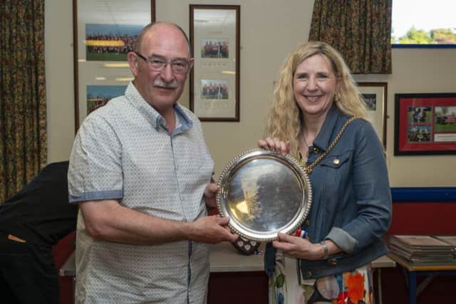 Morpeth Mayor Alison Byard presents Colin Tait with his award. Picture by Darren Turner.